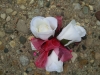 wristlet of white spray roses