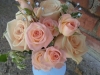 Bouquet of large and spray blush colored roses