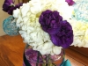 fresh centerpieces: white hydrangeas with purple mini carnations and teal spheres