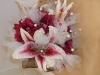 Fresh/silk bouquet; gerbs, star gazer lilies, tulle, beaded wire