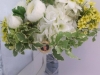 Fresh ranulunus, succulents, silk white hydrangea, yellow wax with keep sake