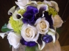 Fresh bouquet purple throat calla lilies, white roses, green hydrangeas, purple lizzy, purple roses, variegated mini pit