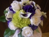 Fresh bouquet purple throat calla lilies, white roses, green hydrangeas, purple lizzy, purple roses, variegated mini pit
