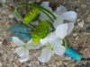 Corsage: Hydrangea pieces, green buttons, ribbon tufts, bears grass, stem wrapped in ribbon